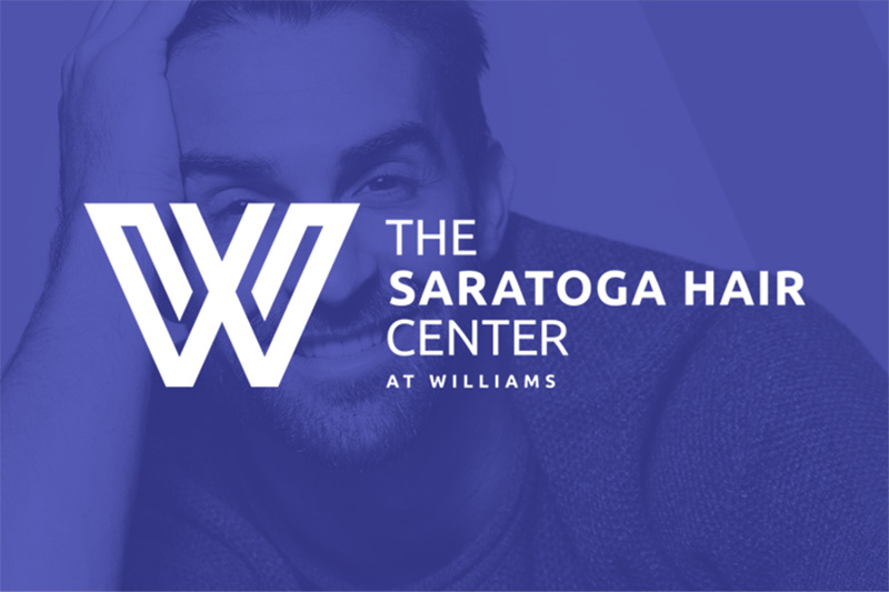 The Saratoga Hair Center; man resting on arm | Albany, Latham, Saratoga NY, Plastic Surgery